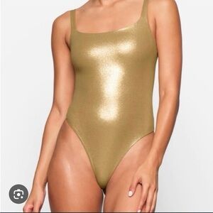 Skims gold metallic “fits everybody” square neck bodysuit